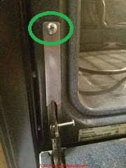 Jenn air oven door retaining clip removal (C) Daniel Friedman at InspectApedia.com