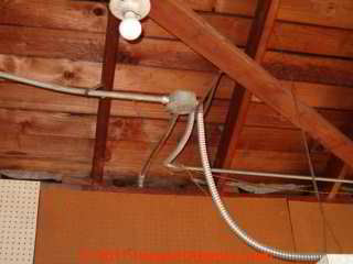 Rigid and flexible metallic electrical conduit in an older home (C) Daniel Friedman