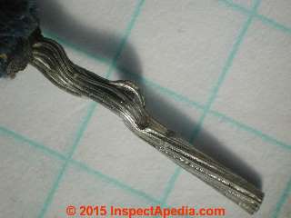 Solder on end of tinned copper multi-strand #12 wire of a 1960's fluorescent light fixture (C) Daniel Friedman
