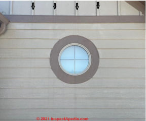 Stains on siding below battens (C) InspectApedia Tim