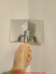 Drywall corner trowel Marshalltown No 23 used with mesh tape to repair a corner (C) Daniel Friedman at InspectApedia.com