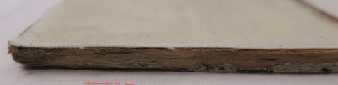 Unidentified board product used as a painting base, paper-based (C) InspectApedia.com Gianatta