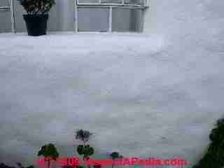 Straw bale constructed home wall cracks © Daniel Friedman at InspectApedia.com