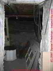 Photograph of an open cistern at an old property.