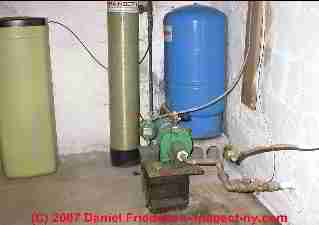 Photograph of a 1-line jet pump (shallow well) and water softener